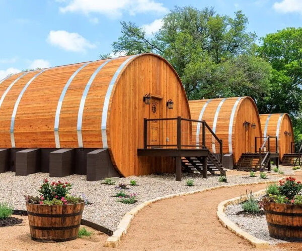 $2.35 Million Texas Estate Comes Complete With Four Quirky Wine-Barrel Cabins—and a Bottleful of Lucrative Business Potential