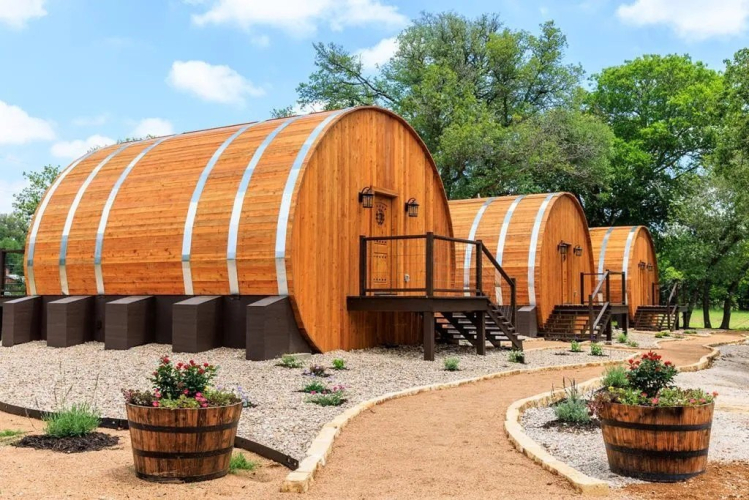 $2.35 Million Texas Estate Comes Complete With Four Quirky Wine-Barrel Cabins—and a Bottleful of Lucrative Business Potential