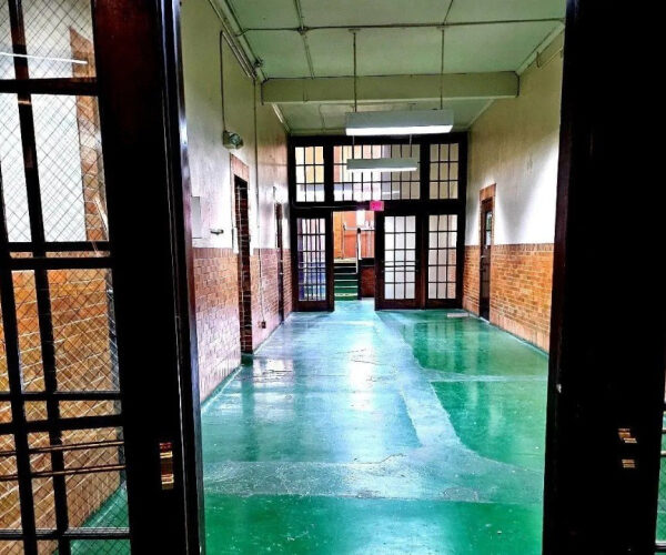 Listing for Former School-Turned-Apartment Building Goes Viral Thanks to Sinister Image of Laundry Room: ‘Something Bad Happened Here’